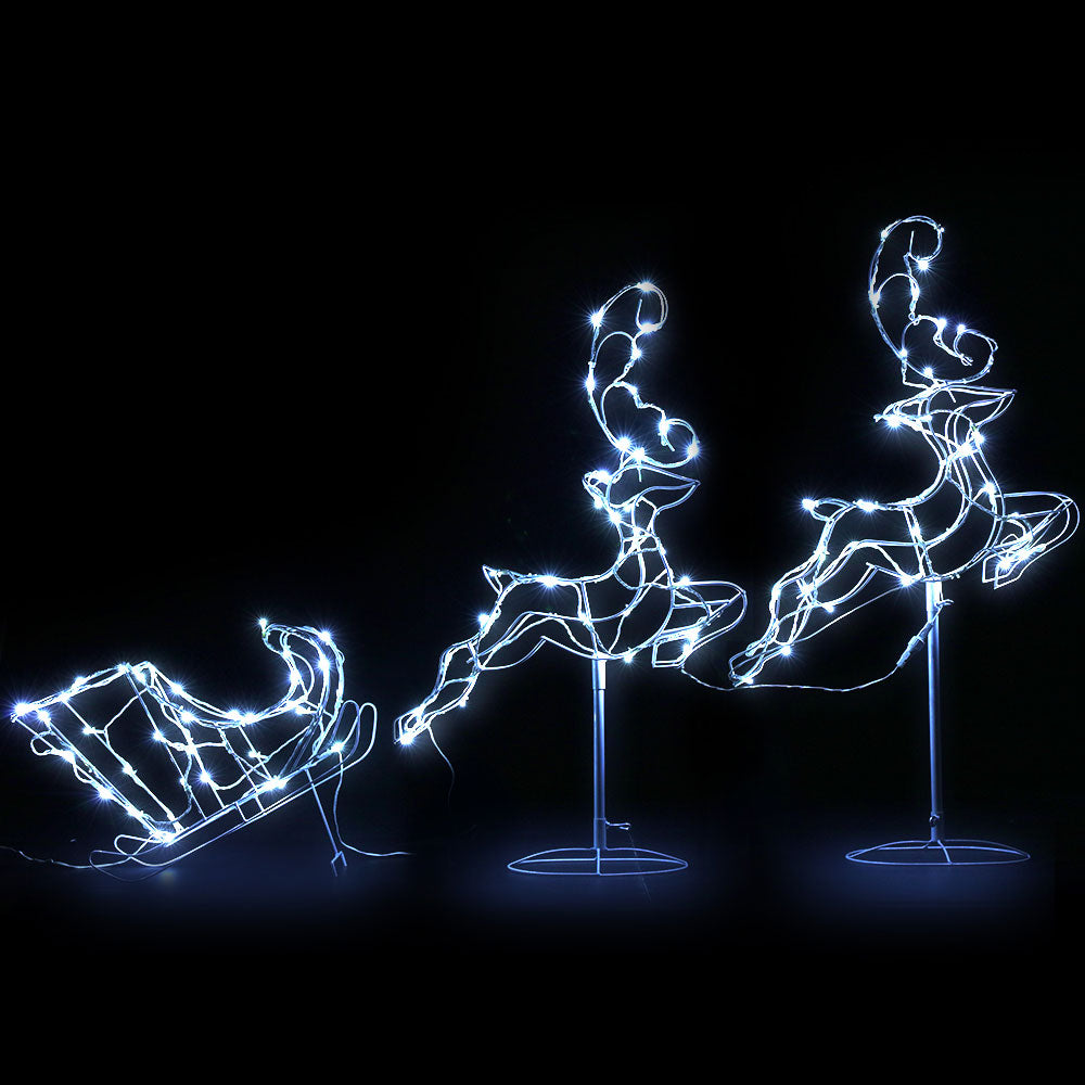 A beautiful LED rope light display featuring two reindeer pulling a sleigh, set in a sturdy white metal frame, perfect for Christmas decorations.